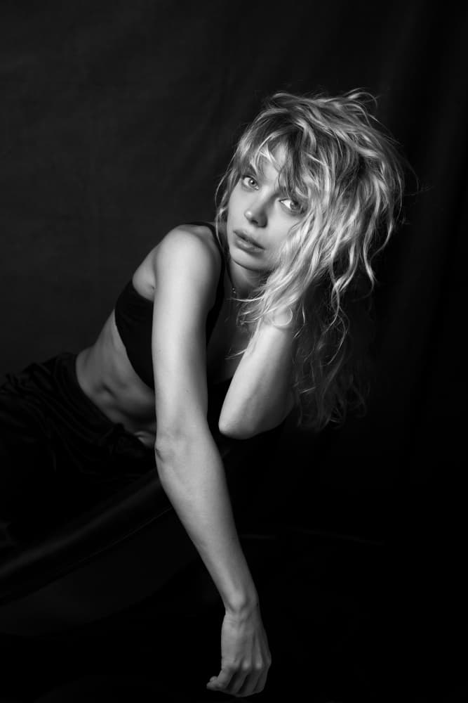 Blonde Woman Intense Gaze by Ruth Franke — canvas wall art
