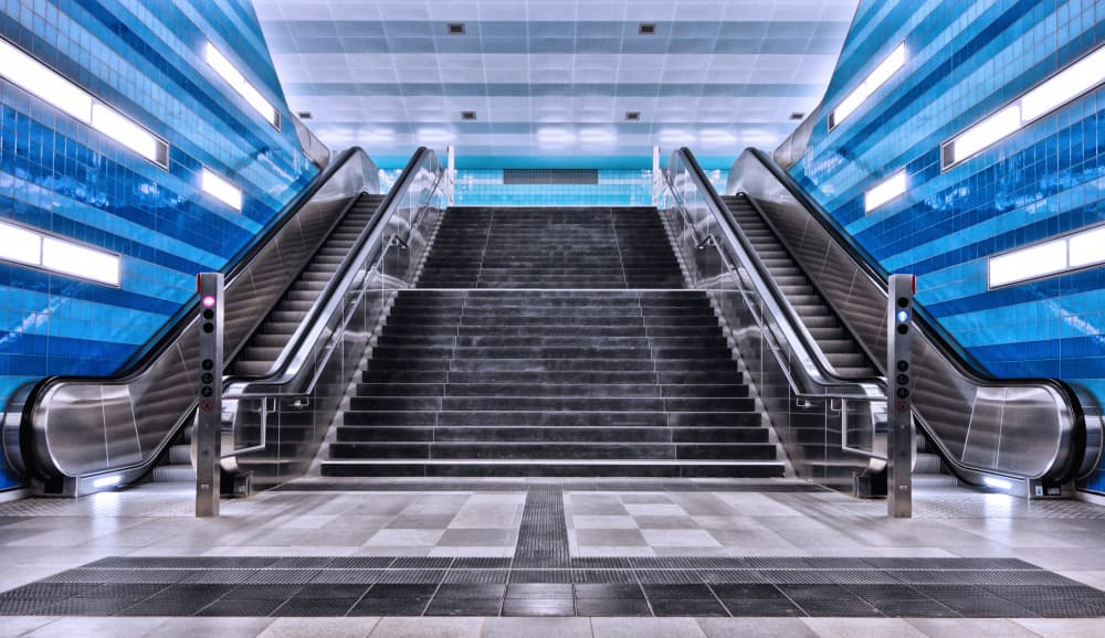 Blue Metro Escalators by Burghard Nitzschmann — canvas wall art