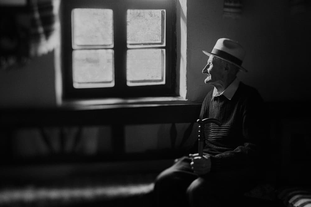 Pensive Man By Window by Marius Cinteza — canvas wall art