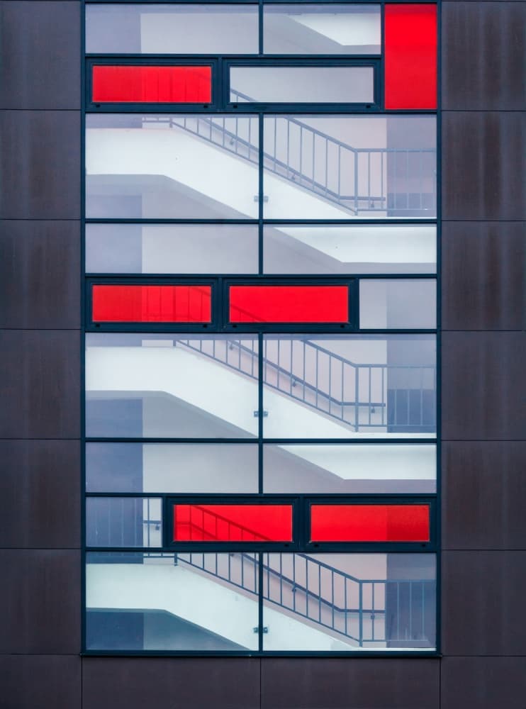Geometric Red Staircase by Karol Važan — canvas wall art