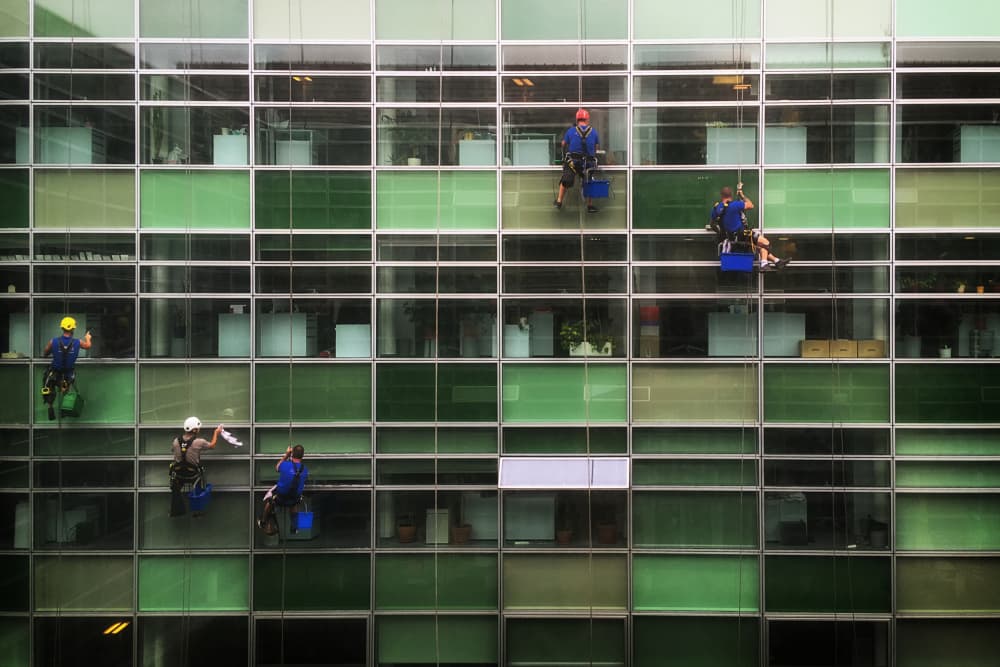 Window Cleaners At Work by Pavol Stranak — canvas wall art