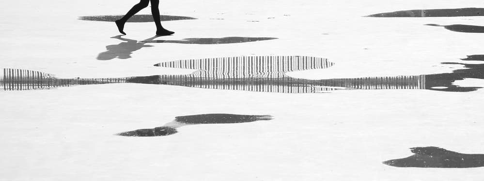 Puddle Walk Silhouette by Jian Wang — canvas wall art