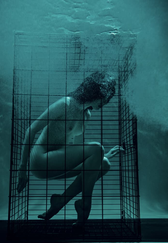 Caged Woman Underwater by Zanna — canvas wall art