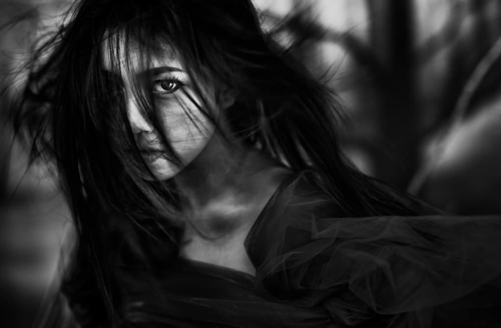 Dark Hair Mysterious Gaze by Yudhistira Yogasara — canvas wall art