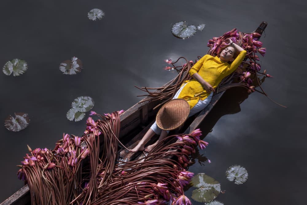 Woman Amidst Lotus Blooms by Lisdiyanto Suhardjo — canvas wall art