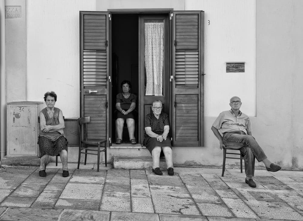 Elderly Street Gathering by Lorenzo Grifantini — canvas wall art
