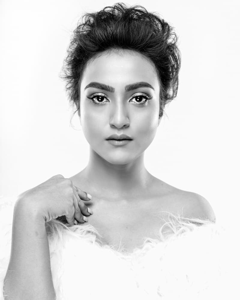 Elegant Feathered Portrait by JAYATU CHANDRA DAS — canvas wall art