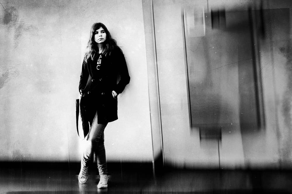 Woman In Dark Coat by Holger Droste — canvas wall art