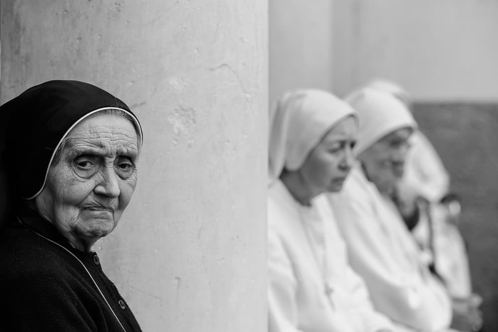 Elderly Nun's Serene Face by Roberto Marini — canvas wall art
