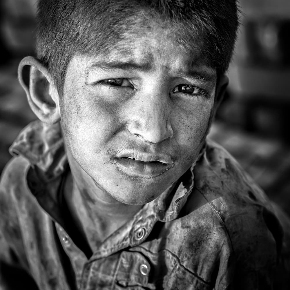 Solemn Young Boy by Mohammadreza Momeni — canvas wall art