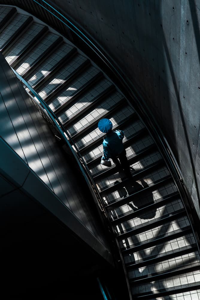 Blue Figure on Modern Stairs by Tetsuya Hashimoto — canvas wall art