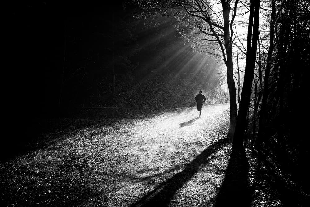Lone Runner Sun Rays by Jurij Bizjak — canvas wall art