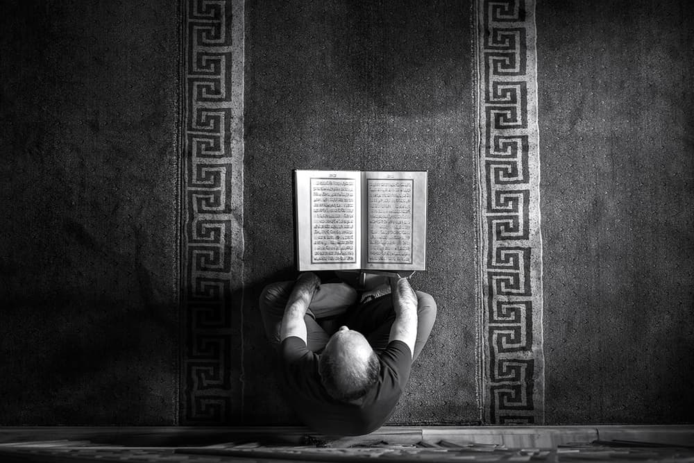 Man Reading Sacred Text by Yavuz Pancareken — canvas wall art