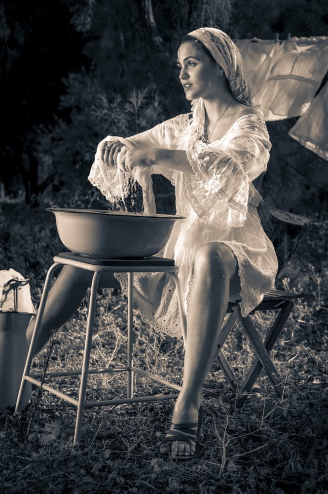 Hand Washing Outdoors by Eyal Alcalay — canvas wall art