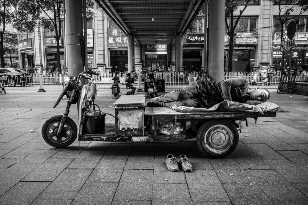 Street Nap on Tricycle by Craig Meakin — canvas wall art