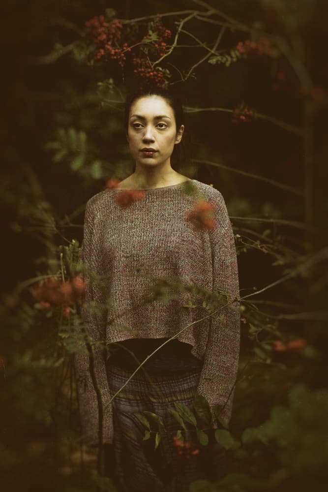 Pensive Woman in Forest by Jacob Tuinenga — canvas wall art