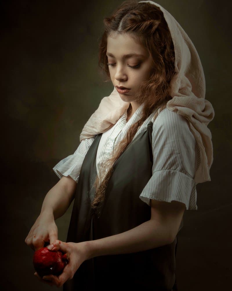 Pensive Girl and Apple by Khaksar — canvas wall art