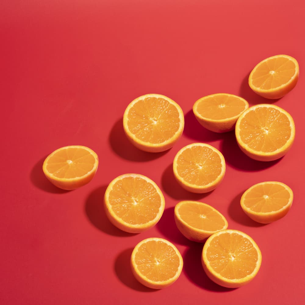 Sunny Orange Halves by Julia Ramiro — canvas wall art