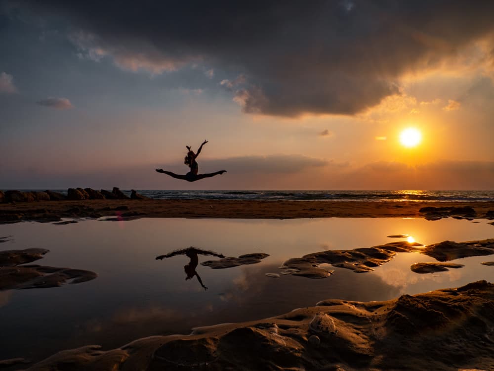 Graceful Sunset Leap by Svetlana Kirzh — canvas wall art