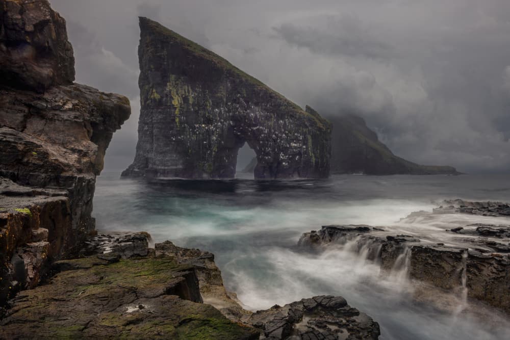 Dramatic Coastal Arch by Hans Repelnig — canvas wall art