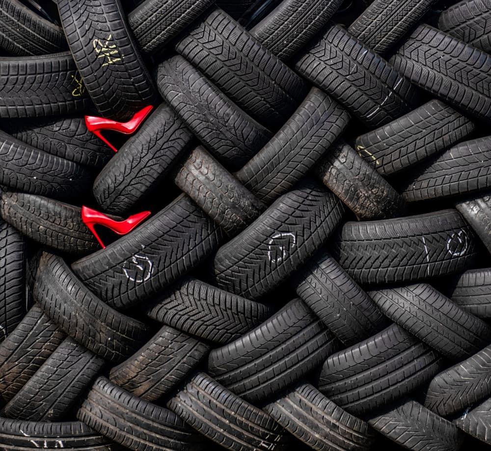 Red Heels Black Tires by FranzStaab — canvas wall art