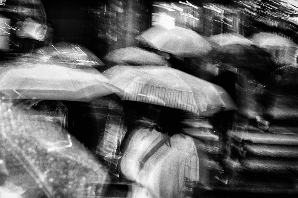 Umbrellas In Motion by Shinji Isobe — canvas wall art