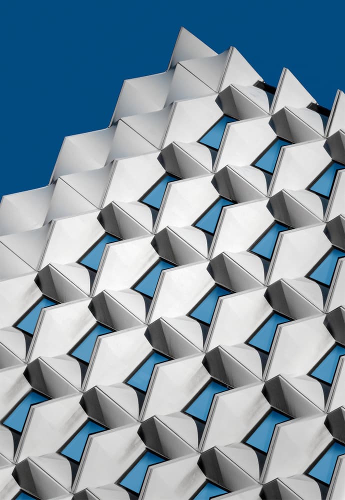 Blue Geometric Facade by Alfonso Novillo — canvas wall art