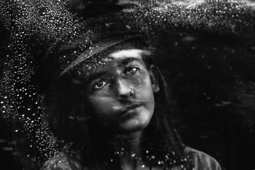 Girl By Rainy Window by Ummu Nisan Kandilcioglu — canvas wall art