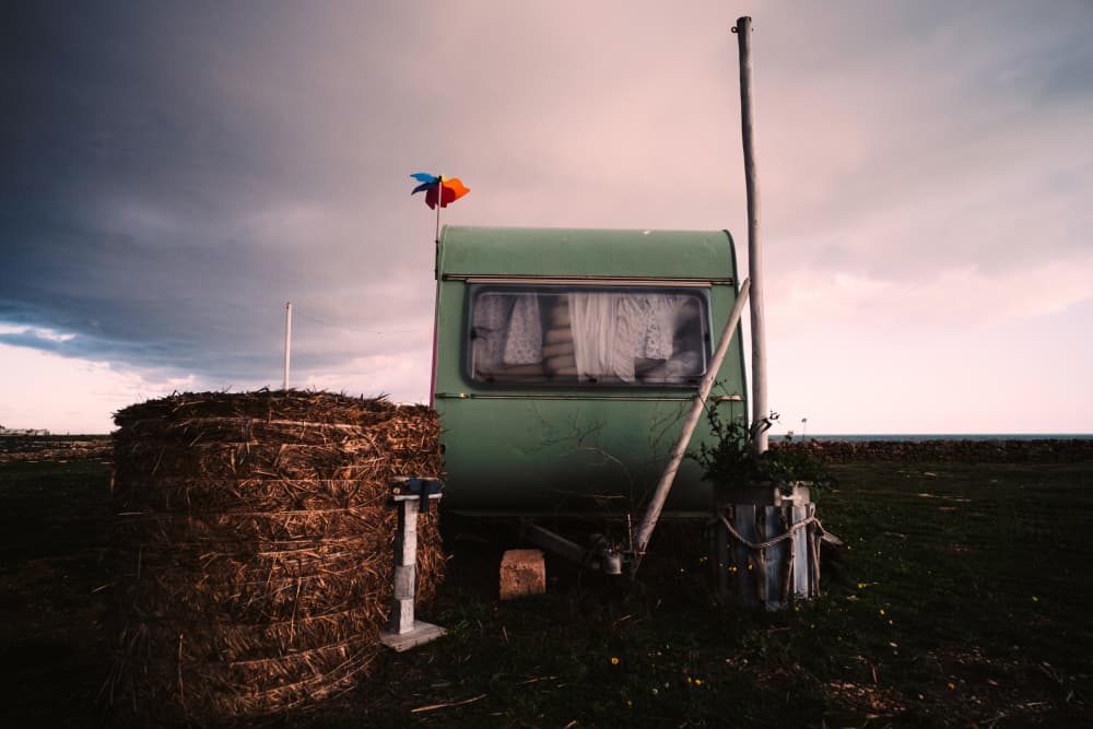 Moody Caravan Coastal View by Vito Muolo — canvas wall art