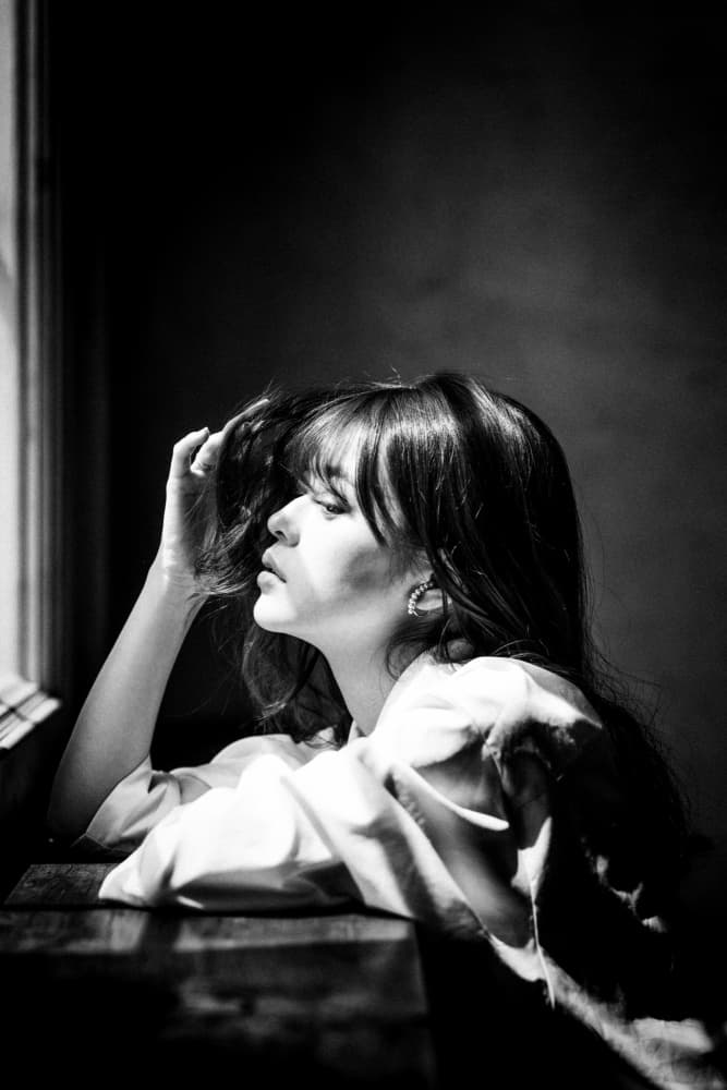Pensive Woman In Light by Masatoshi Washimi — canvas wall art