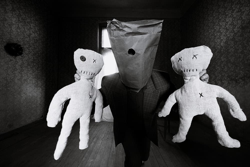 Mysterious Figure with Dolls by mario grobenski - psychodaddy — canvas wall art