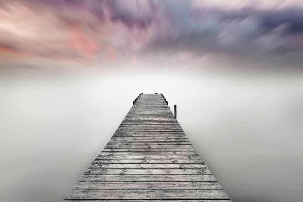 Misty Dawn Pier by Joaquin Guerola — canvas wall art