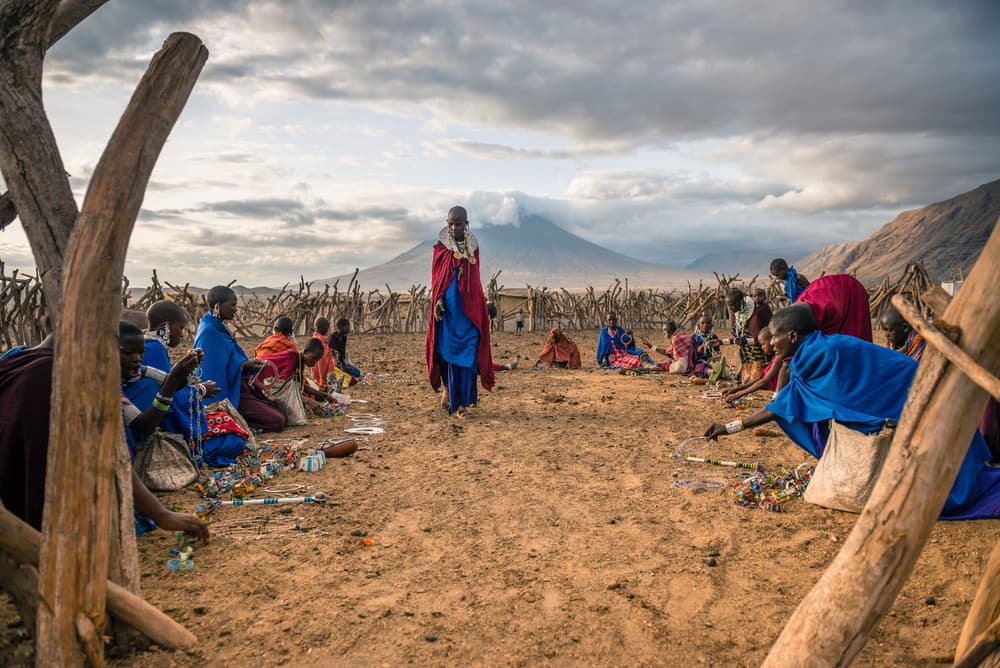 Maasai Women Crafting Beads by Vlad Cioplea — canvas wall art