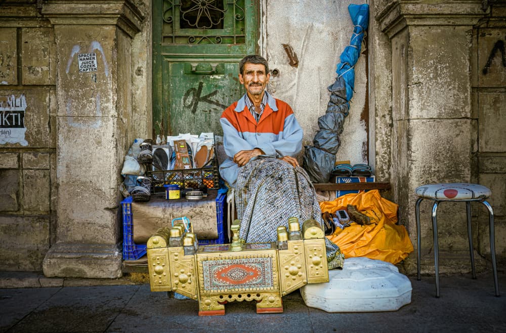 Smiling Street Shoemaker by Marco Tagliarino — canvas wall art