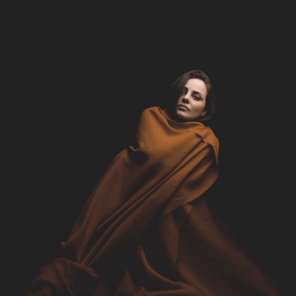 Moody Orange Portrait by Moein Hasheminasab — canvas wall art