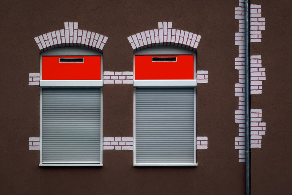 Red Shutter Windows by Hans-Wolfgang Hawerkamp — canvas wall art