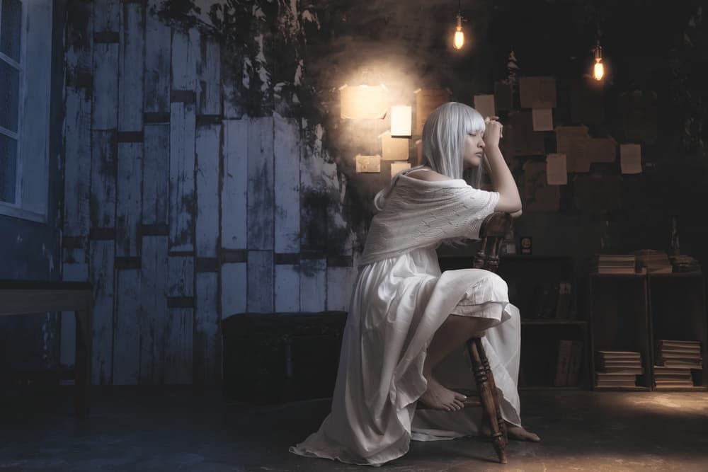 Pensive Woman in White by Suzuhiko Suzuki — canvas wall art