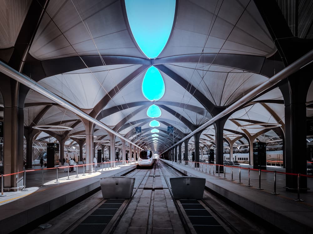 Sky-Lit Train Station by Asmaa ElTouny — canvas wall art