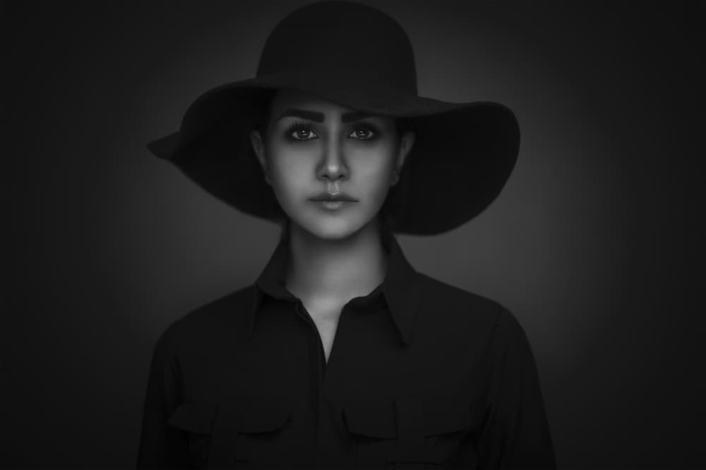 Dramatic Woman In Hat by Parsa Bagheri — canvas wall art