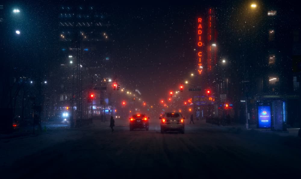 Snowy City Night by Javier de la Torre — canvas wall art