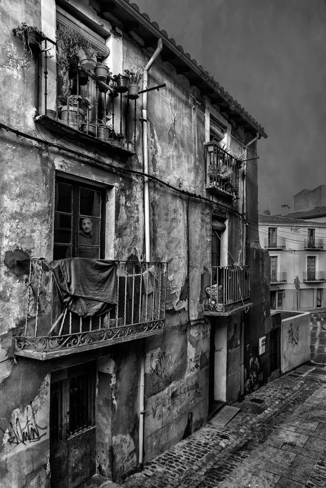 Man in Old Window by Jose C. Lobato — canvas wall art