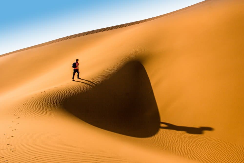 Desert Hiker Shadow by Mohammad Fotouhi — canvas wall art