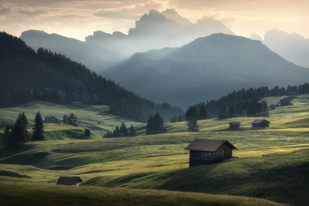 Misty Mountain Valley Huts by Zbyszek Nowak — canvas wall art