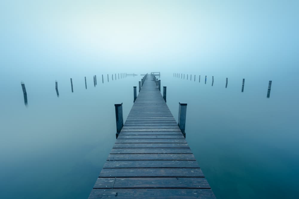 Misty Blue Pier by Ulrike Eisenmann — canvas wall art