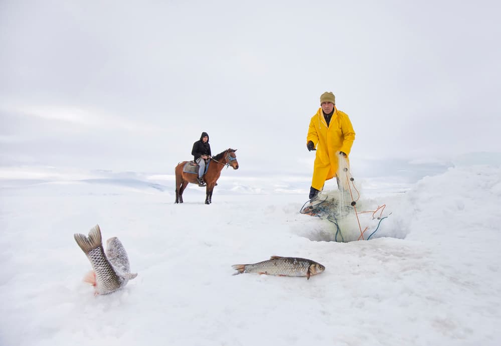 Winter Ice Fishing by Nese Ari — canvas wall art