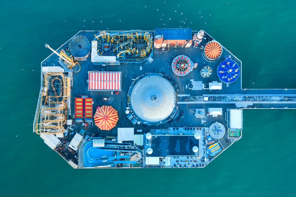 Vibrant Pier Amusement Park by Jure Kravanja — canvas wall art