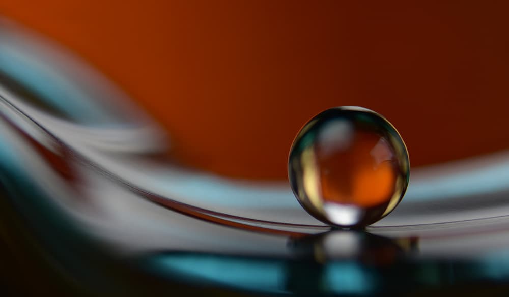 Reflecting Orange Sphere by Heidi Westum — canvas wall art