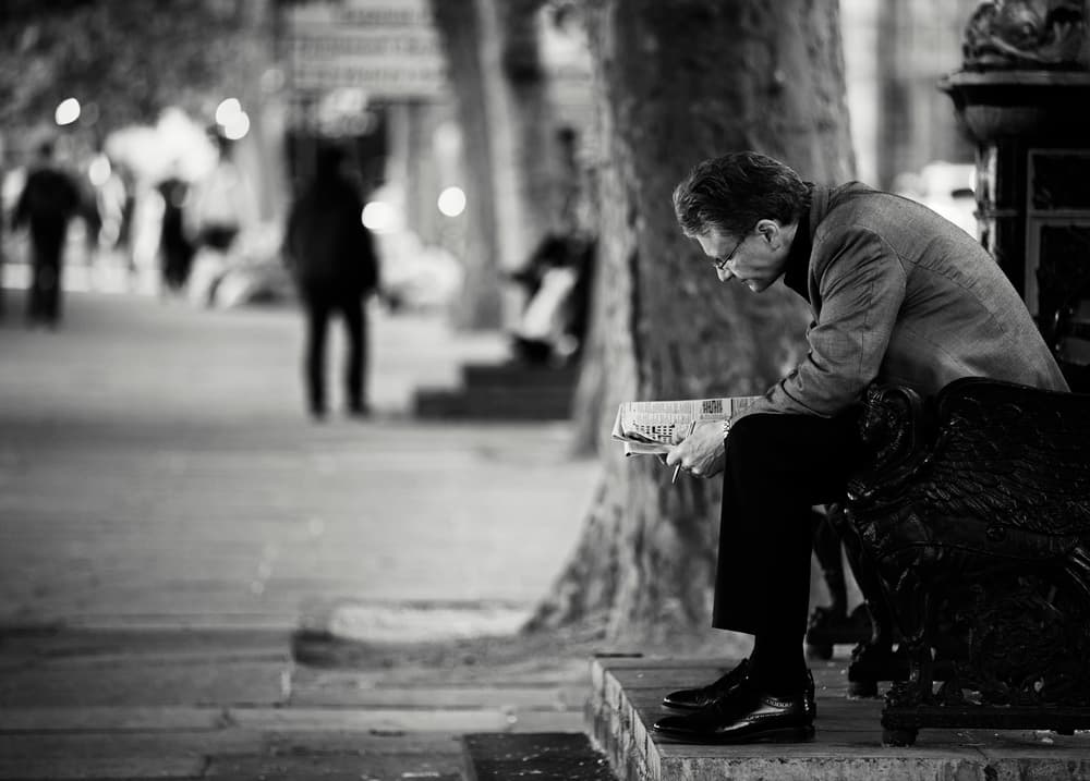 Quiet Park Reading by Julien Oncete — canvas wall art