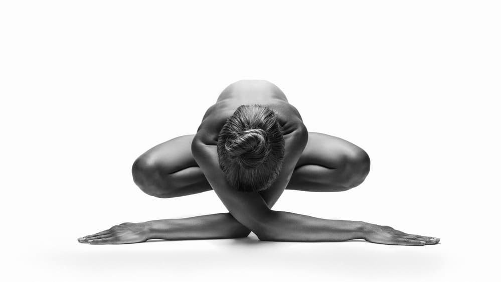 Serene Nude Yoga Pose by AURIMAS VALEVICIUS — canvas wall art