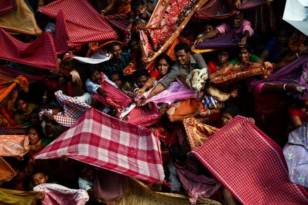 Vibrant Fabric Crowd by Debarshi Mukherjee — canvas wall art
